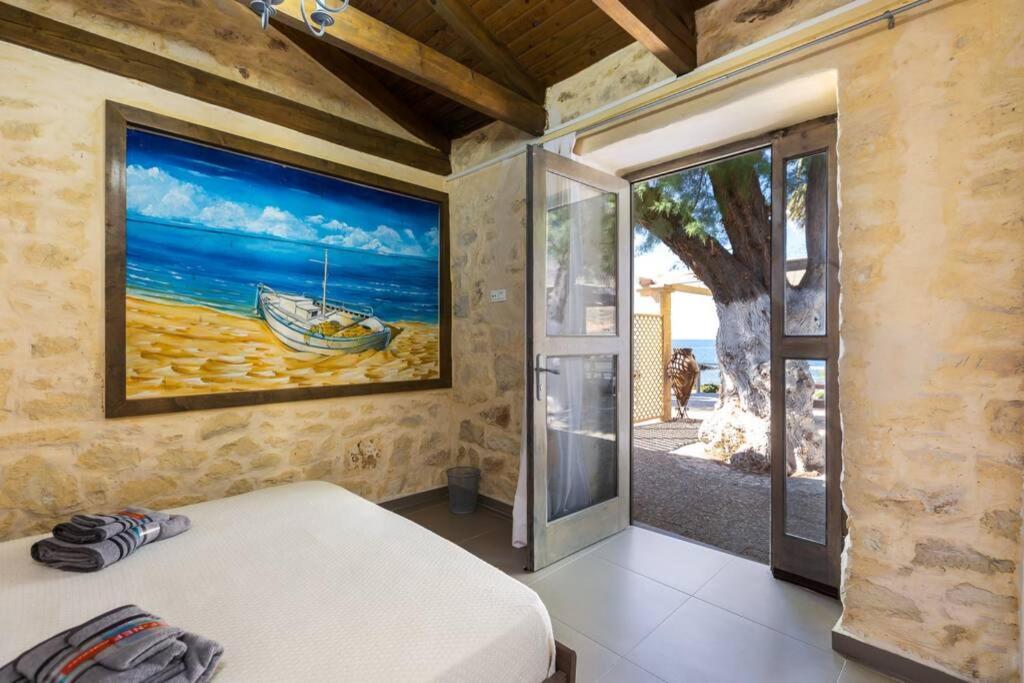 Villa Proto Helidoni - A Cozy Beachfront Villa Petres  Exterior photo